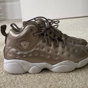 Size 13 gold Jordan’s